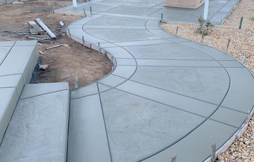 Curved concrete walkway with steps